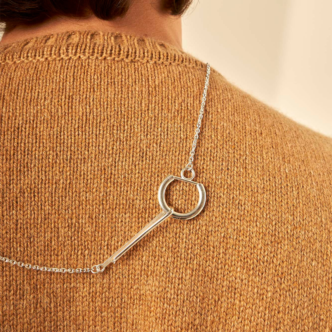 Le collier gousset médaille argent