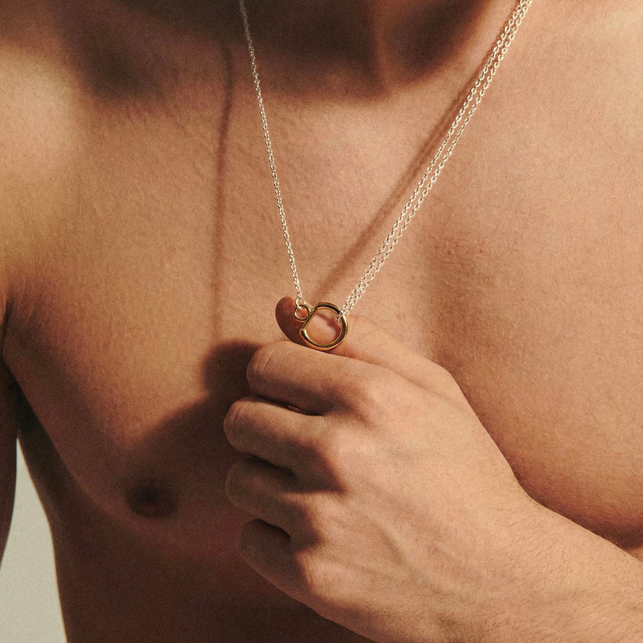 Le collier mini gousset bicolore