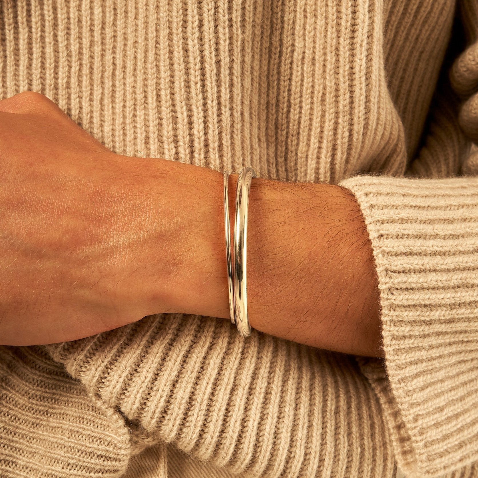Pair of open silver bangles